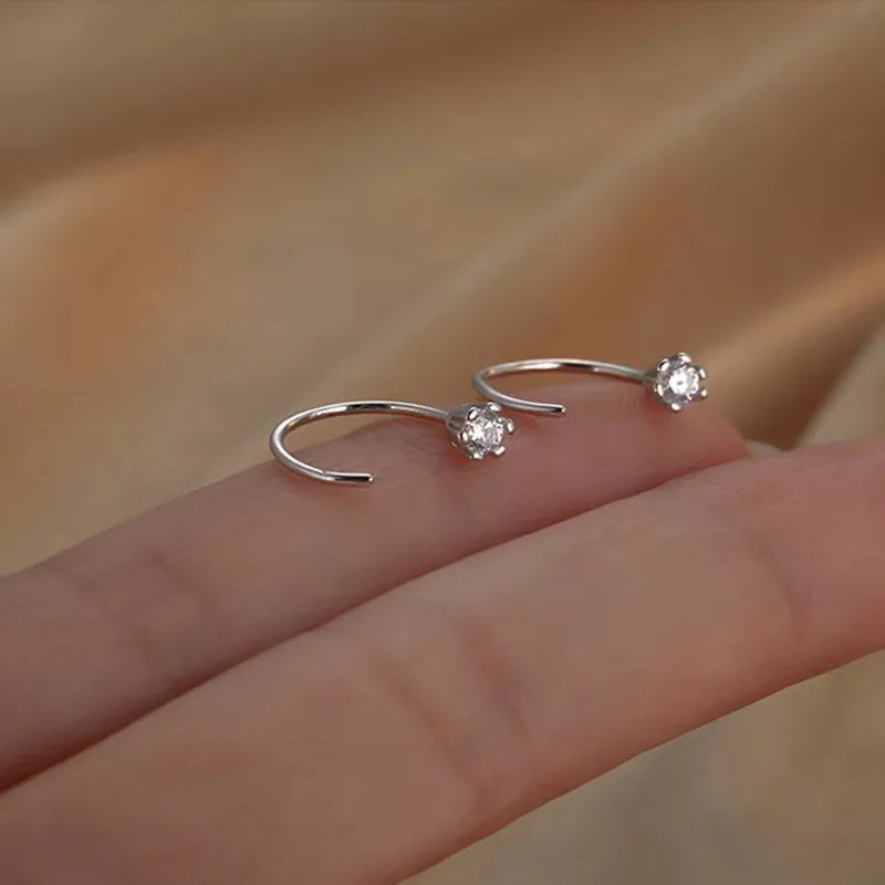 Elegent Minimalist Zircon Stud Earrings for Teens Ear Piercing Earrings Women Men Wedd close-up view