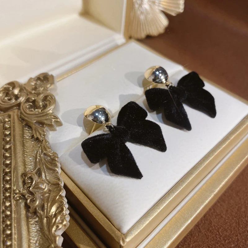 Vintage Black Flocking Bowknot Earrings | Geometric Drop Earrings for Women lifestyle view