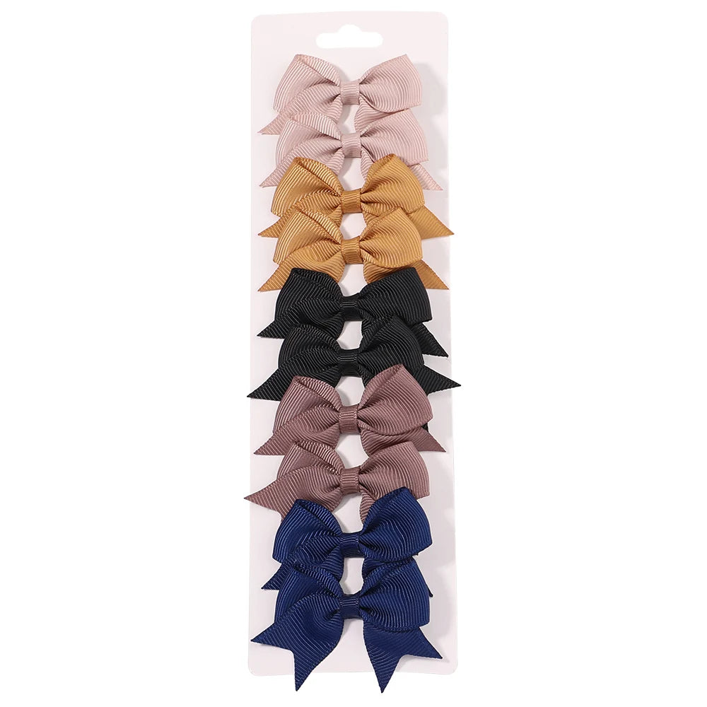 10Pcs/Set New Cute Solid Ribbon Bowknot Hair Clips for Baby Girls Handmade Bows Hairpi close-up view