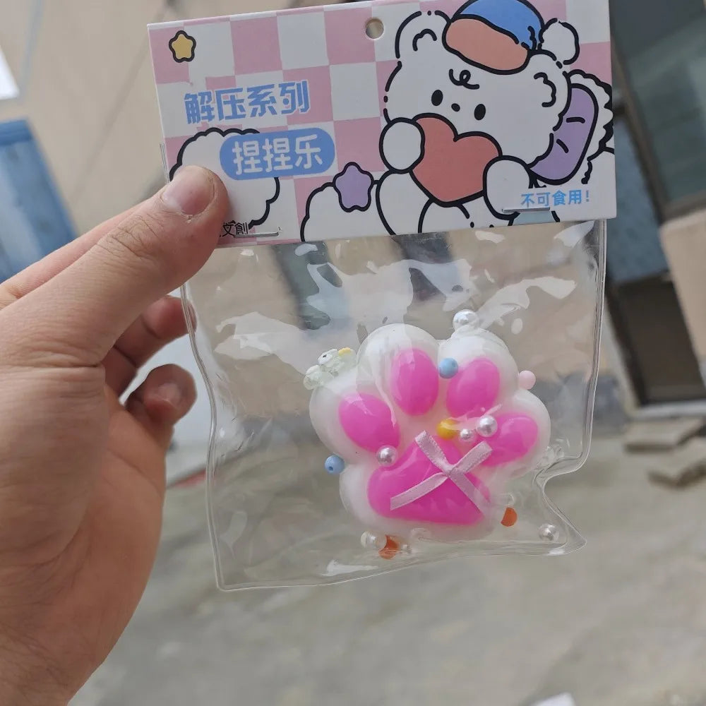 Taba Squishy Bow Cat Paw Fidget Toys | Cute Pink Cat Foot Slow Rebound Toy close-up view
