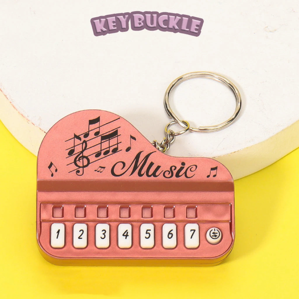 1 Pcs Creative Mini Electronic Piano Keychain Pendant Luminous Music Toy Small Gift lifestyle view