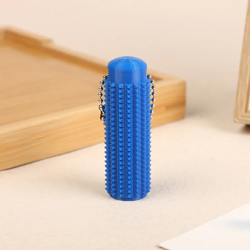 Little Ouchies Pocket-Sized Mini Spiky Grippie Stress Relief Keychain Fidget Toy | Anx close-up view
