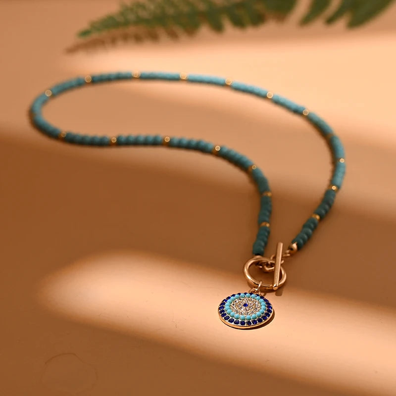 Colorful Stone Choker Necklace | Round Evil Charm Pendant for Women close-up view