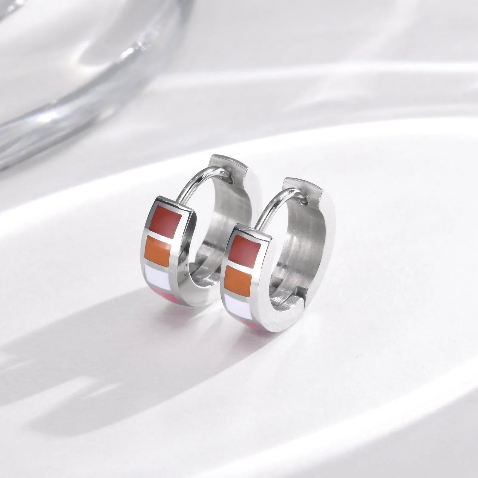 LGBT Rainbow Huggie Hoop Earring for Leibian Gay, Pride Flag Hinged Ear Piercings, Sta close-up view