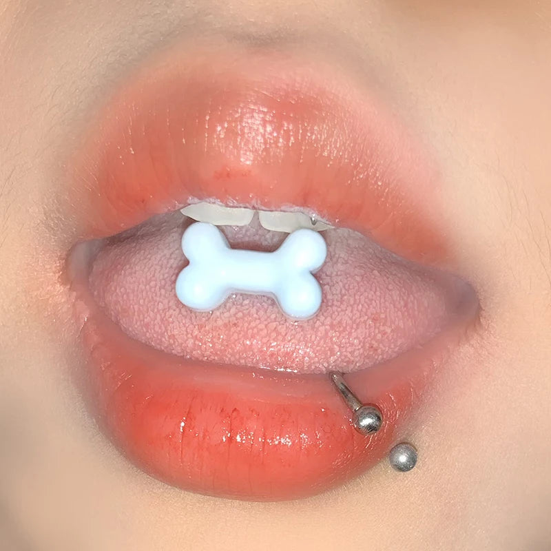 Personalized Cute Bone Tongue Nail Fashion Tongue Ring Stainless Steel Tongue Nail Pun close-up view