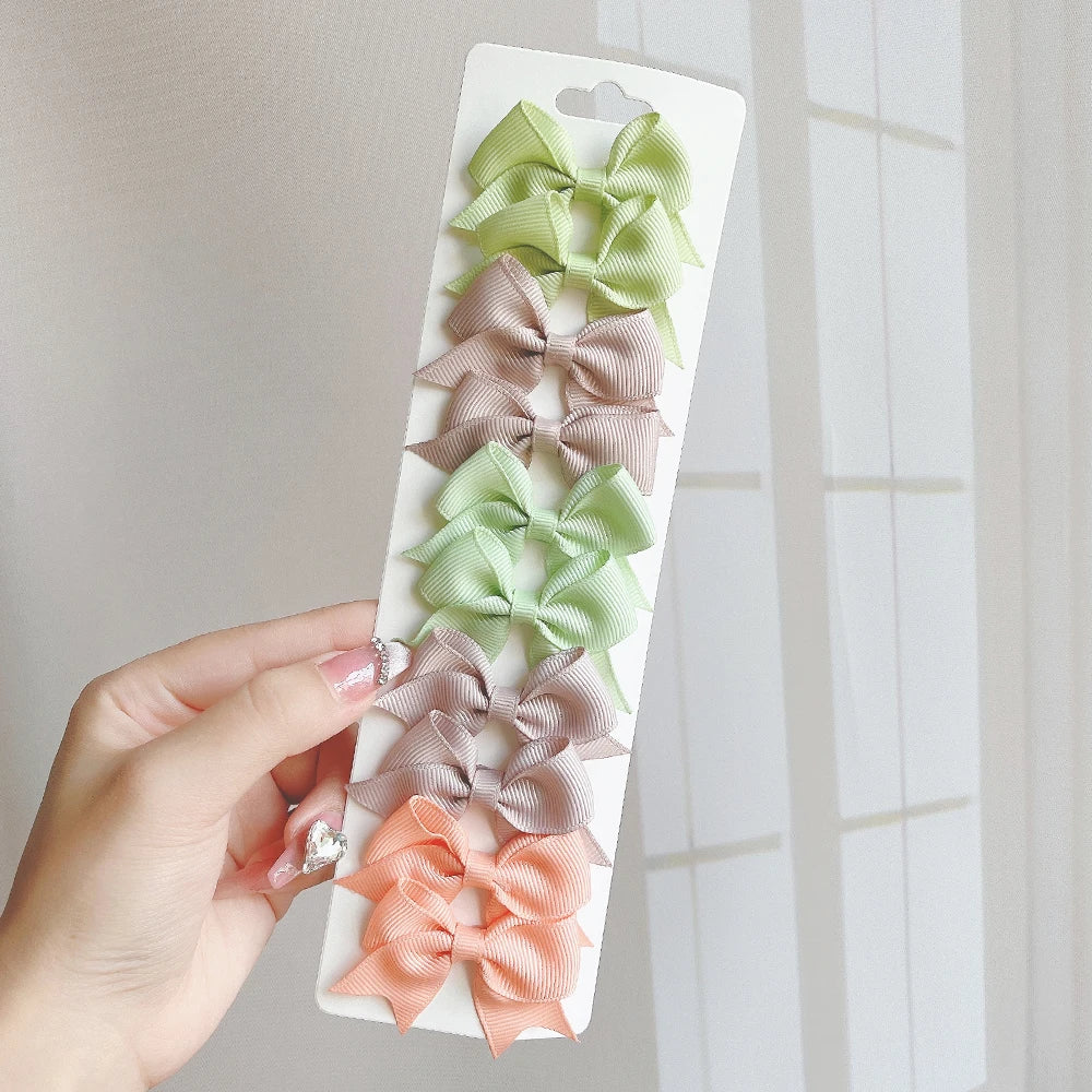 10Pcs/Set Solid Color Kids Bows Hair Clips for Baby Girls Handmade Ribbon Bowknot Hai lifestyle view
