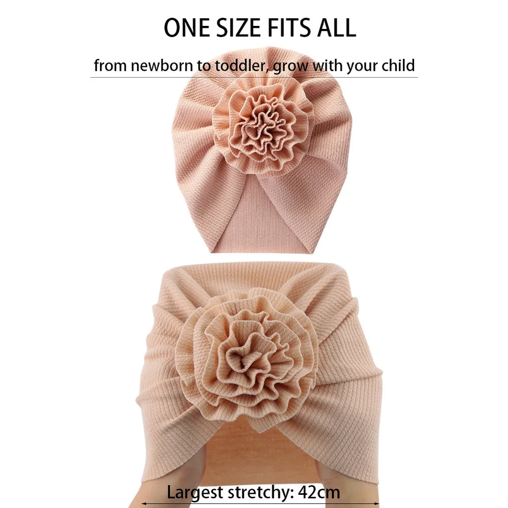 Big Blossom Flower Ribbed Turban Baby Hat | Soft Cotton Topknot Bonnet for Newborns an close-up view