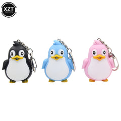 Adorable Penguin Keychain with LED Light and Sound | Fun Cartoon Car Pendant close-up view
