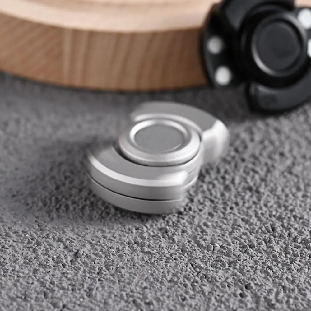 Stainless Steel 3 in 1 Fidget Spinner and Slider Combo | Click Button Metal Toy for A lifestyle view