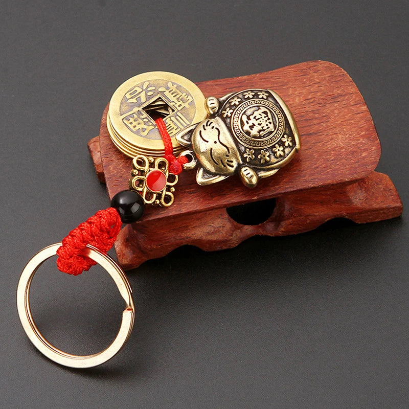 Handmade Brass Feng Shui Coins Keychain | Lucky Cat Car Keychain with Five Emperors Mo close-up view