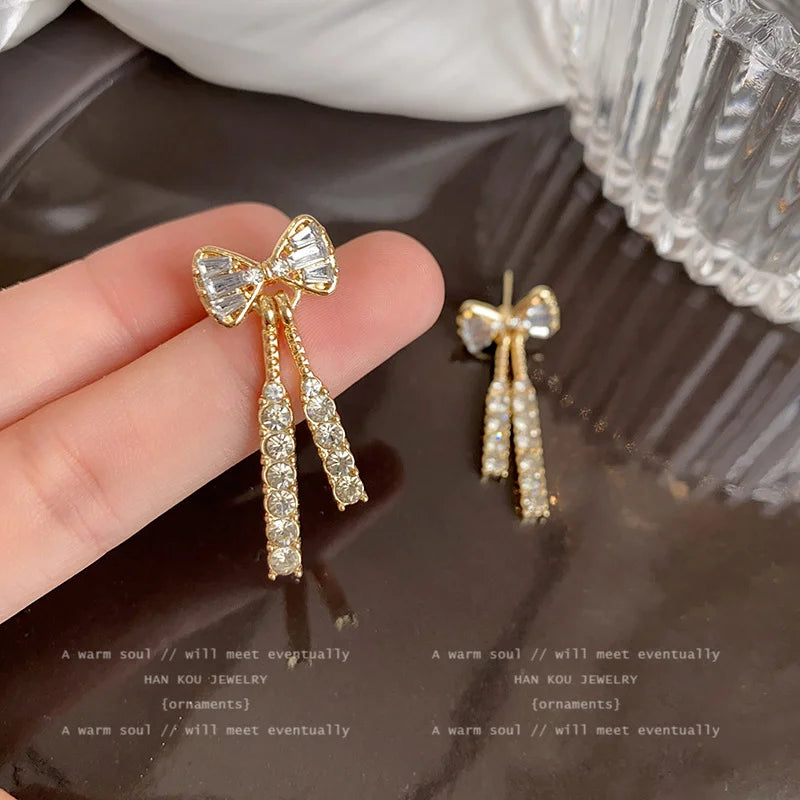 Gold Color Shiny Bow Stud Earrings For Women Fashion Exquisite Dainty Rhinestone Bow D close-up view