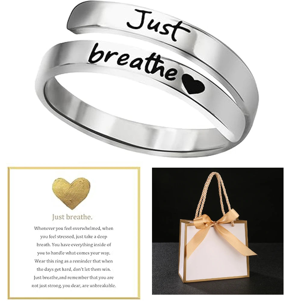 Just-Breathe-Heart-Ring-for-Women-Men,-Stainless-Steel-Spiral-Wrap-Healing-Rings,-Insp close-up view