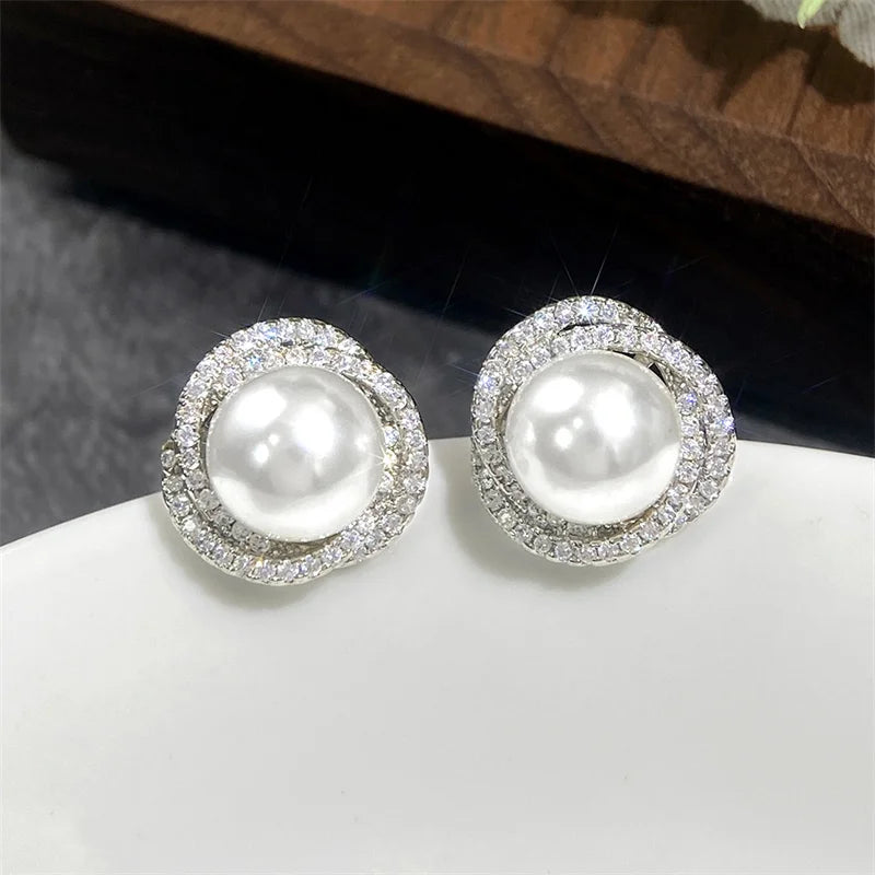 Huitan Sparkling Cubic Zirconia Imitation Pearl Stud Earrings | Silver Tone Fashion Je close-up view