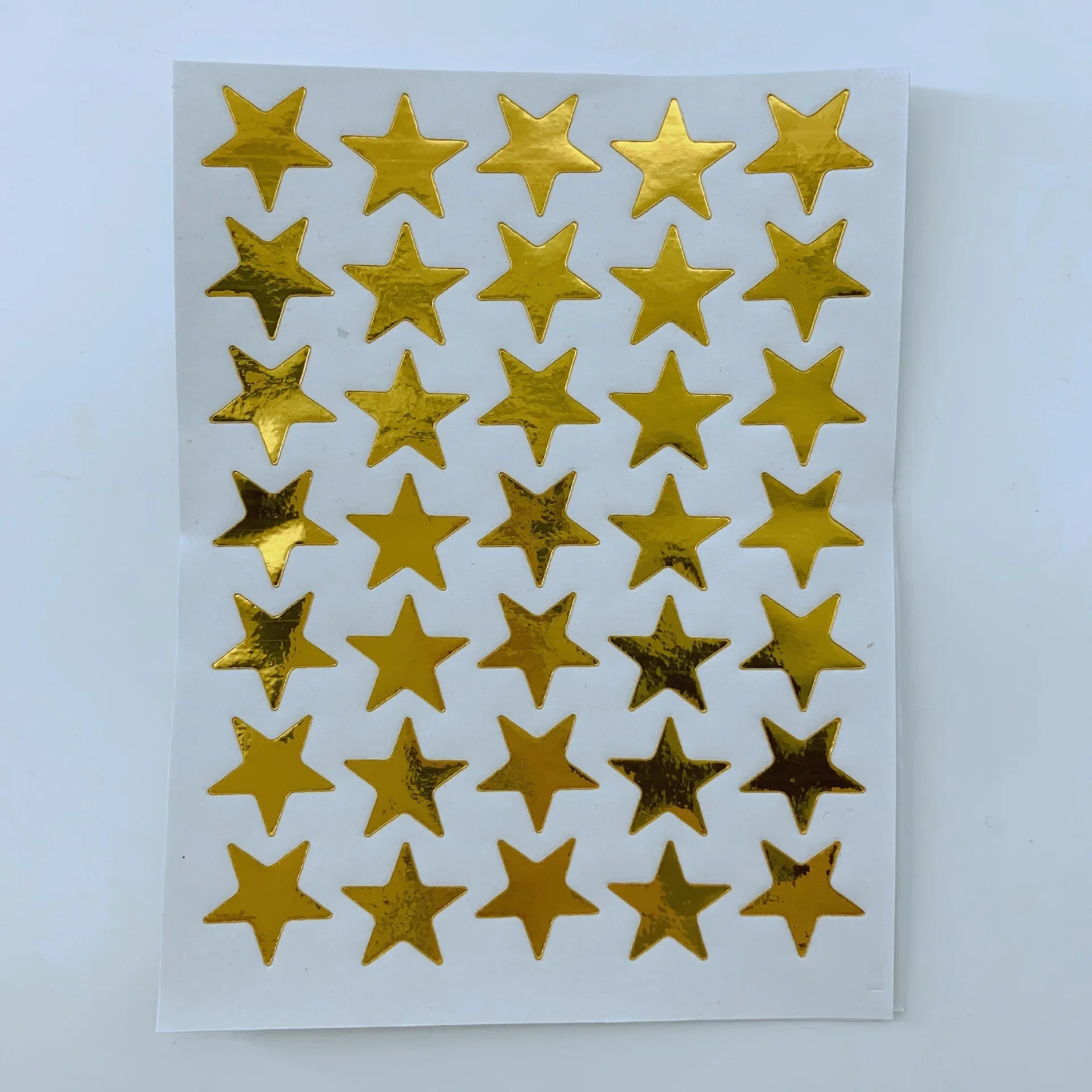 Gold Star Sticker Set for Teachers and Class Rewards | 10 Sheets of Five Pointed Star close-up view