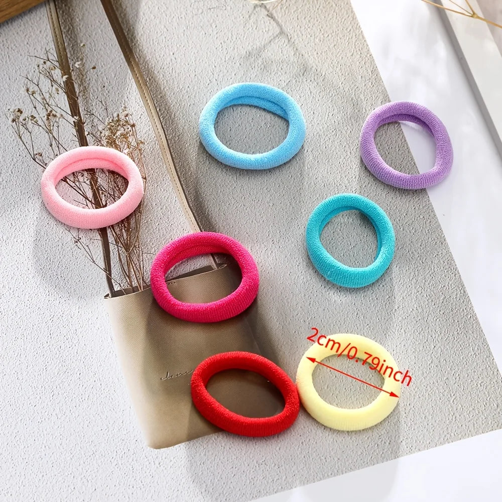 300 Packs of colorful Hair Ties, Durable and Non-Damaging to Hair. Perfect for Cute Girls Using Them for Everyday Ponytails.